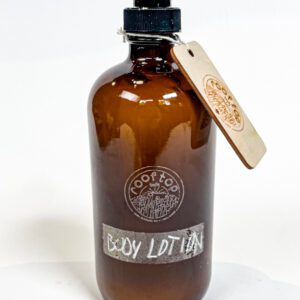 glass container with body lotion