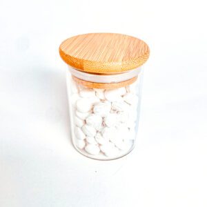 glass jar with toothpaste tabs