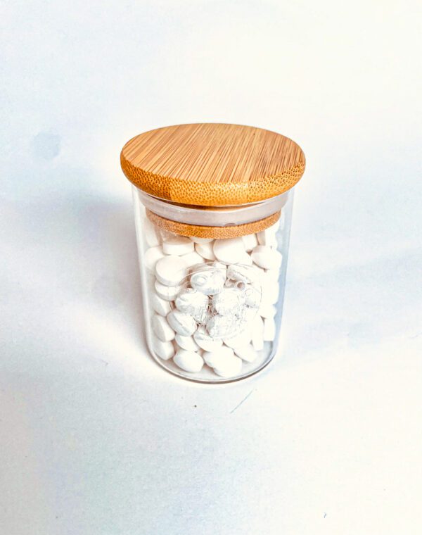 toothpaste tablets in glass jar